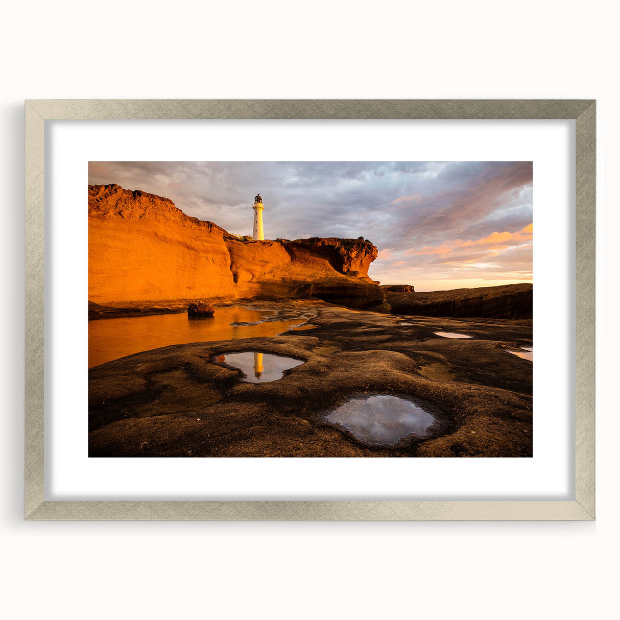Textured abstract art print of Wellington with silver frame and mat, featuring muted earth tones, ideal for bedroom art.