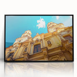 Large abstract wall art depicting a stylized Buenos Aires cityscape in muted gray and blue tones, framed in black acrylic.