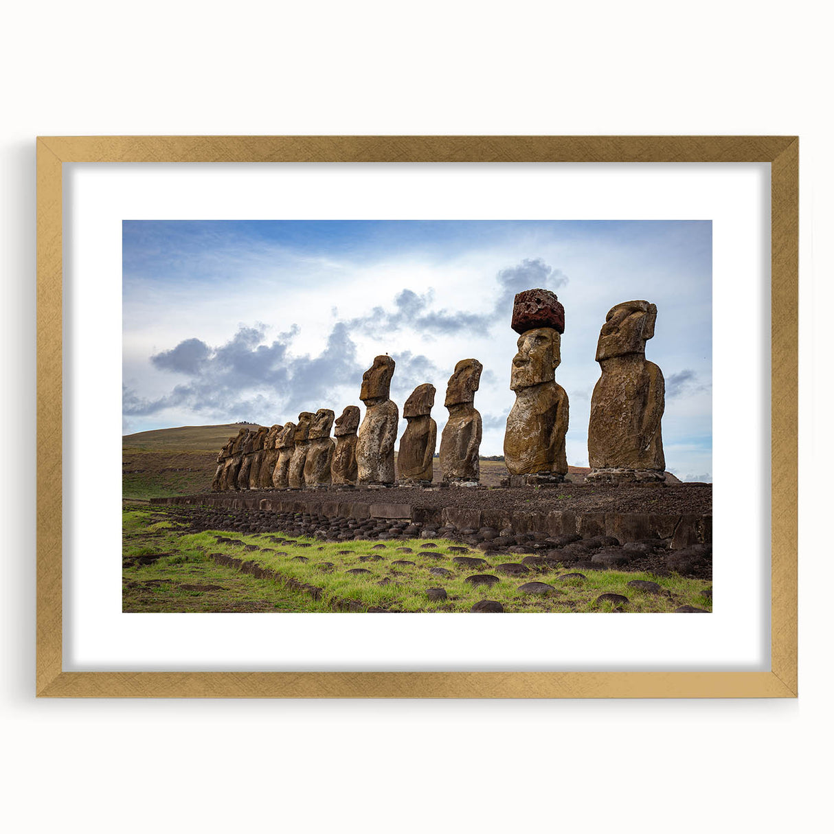 Extra large wall art featuring abstract depiction of Easter Island statues in textured gold tones, framed with a mat.