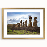 Extra large wall art featuring abstract depiction of Easter Island statues in textured gold tones, framed with a mat.