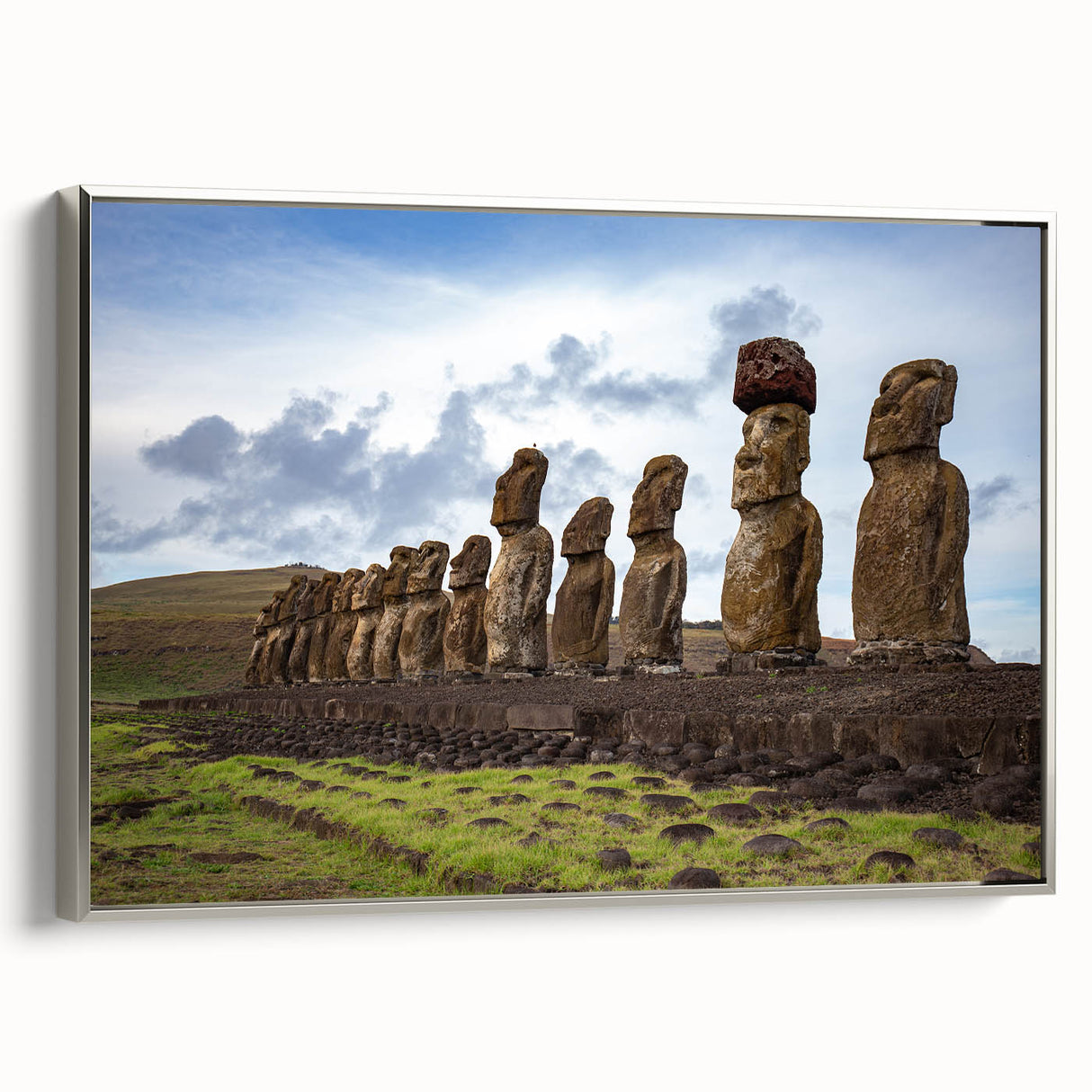 Framed canvas depicting Easter Island statues in a landscape setting, using black and vibrant color tones.