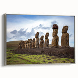 Framed canvas depicting Easter Island statues in a landscape setting, using black and vibrant color tones.