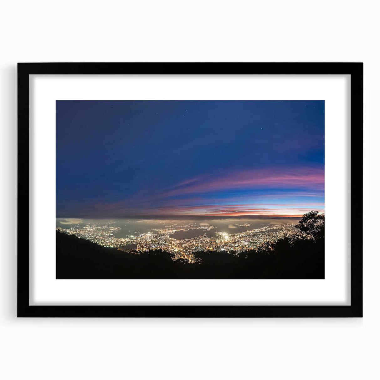 Extra large abstract art print of a colorful Venezuelan landscape on textured canvas, framed in black.