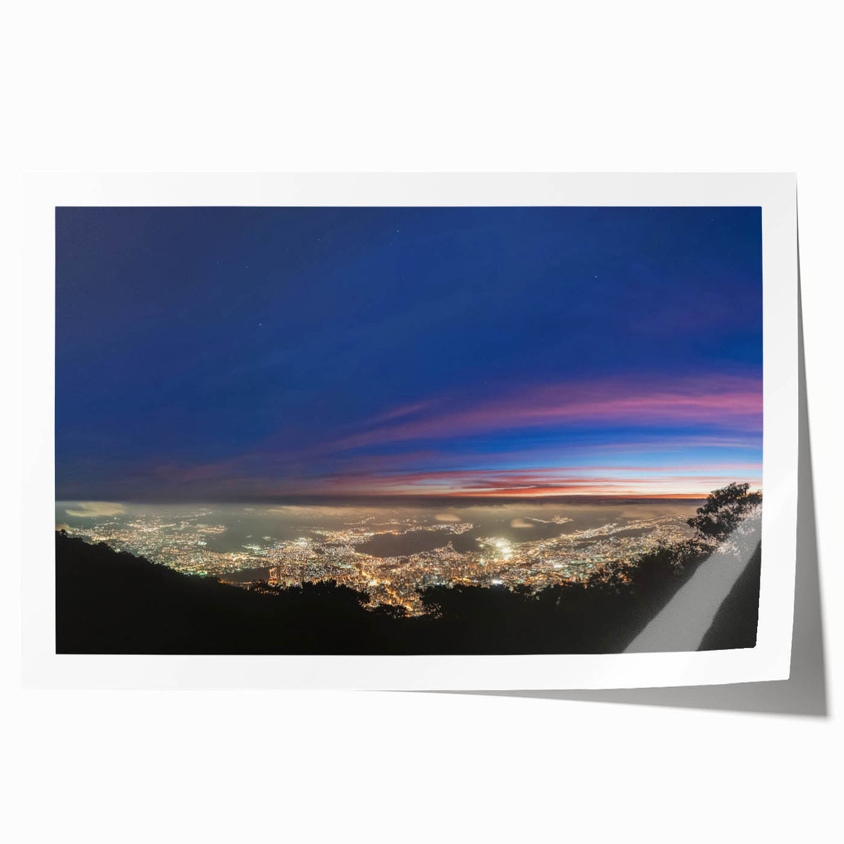 Rolled print of a Venezuelan scenery with lush greenery and waterfall in muted earth tones.