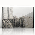 Large abstract wall art of Sedona landscape in muted earth tones, framed in black acrylic.