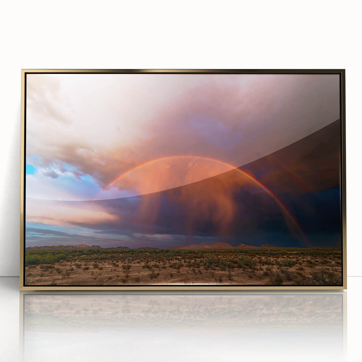 Large art print of Sonoran Desert in Arizona, featuring muted earth tones on a gold-framed acrylic.