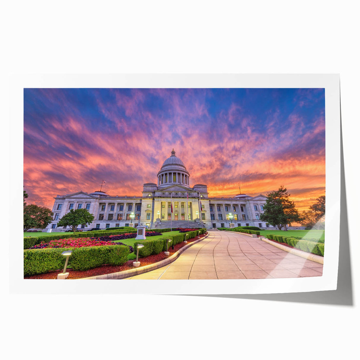 Rolled print of Arkansas scenery with lush greenery and floral elements in soft earth tones, ideal for dining room wall art.