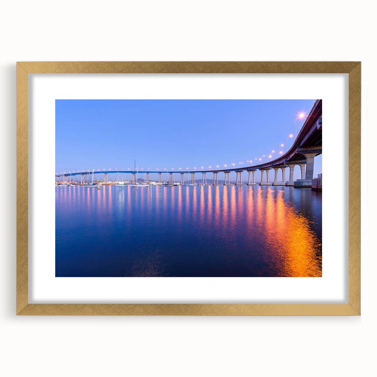 Extra large abstract art print of a textured California scene in muted earth tones, framed in gold.