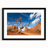 Abstract art print of Death Valley in vibrant, colorful hues on a large textured canvas, suitable for living room decor.