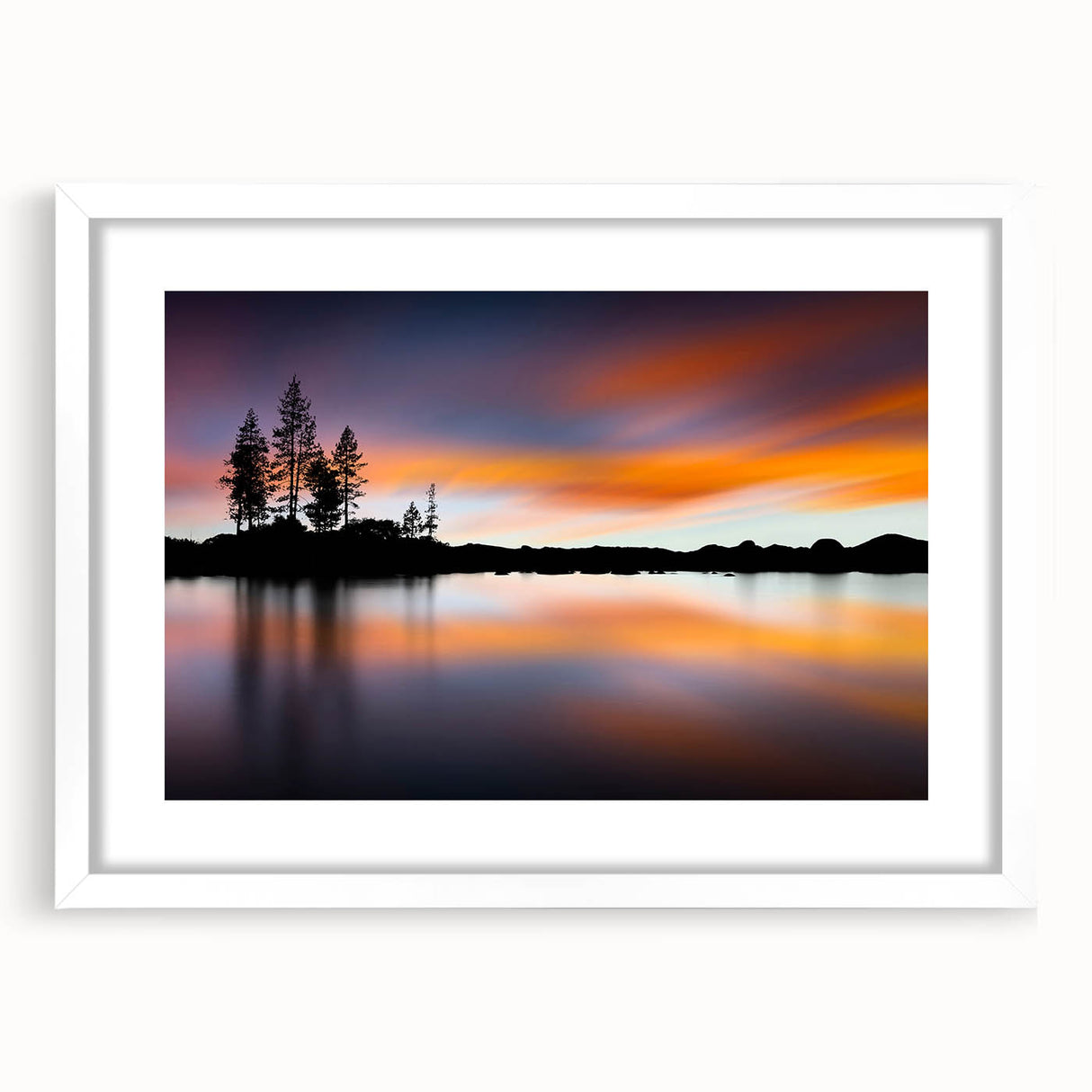 Abstract art print of Lake Tahoe in muted blue and green shades on a framed white mat, ideal for dining room decor.