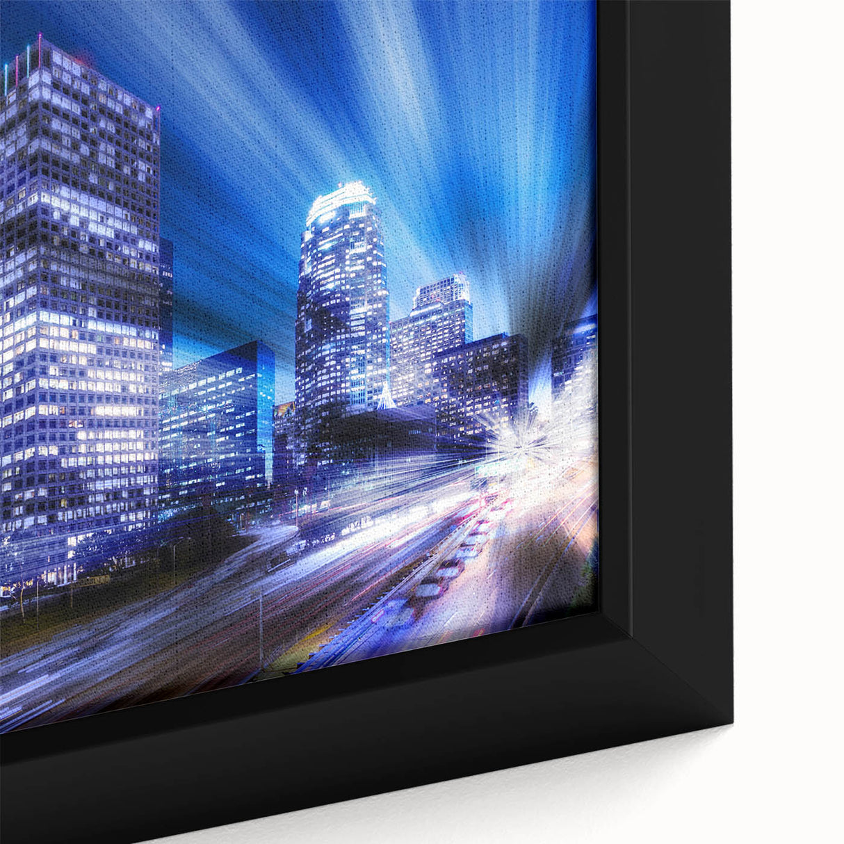 Extra large framed canvas featuring a textured depiction of the Los Angeles skyline in black with colorful accents.