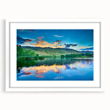 Abstract art print of Boulder, Colorado in muted earth tones on a framed white mat, suitable for dining room decor.