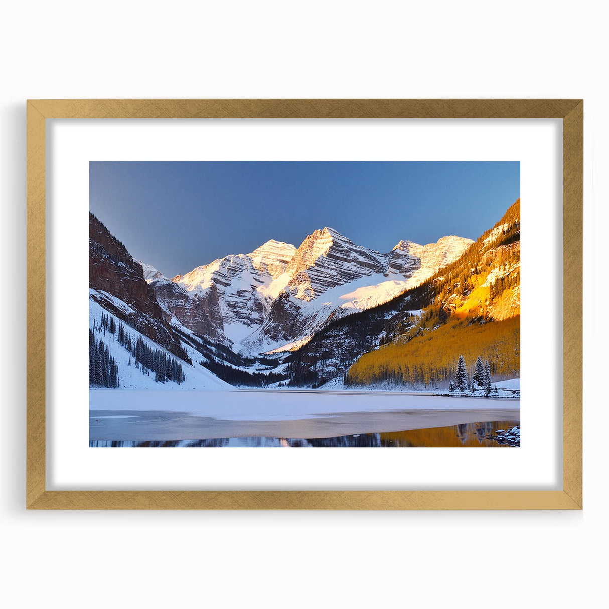 Extra large wall art featuring an abstract rendition of Maroon Bells, Colorado in textured hues of gold and blue.