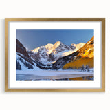 Extra large wall art featuring an abstract rendition of Maroon Bells, Colorado in textured hues of gold and blue.