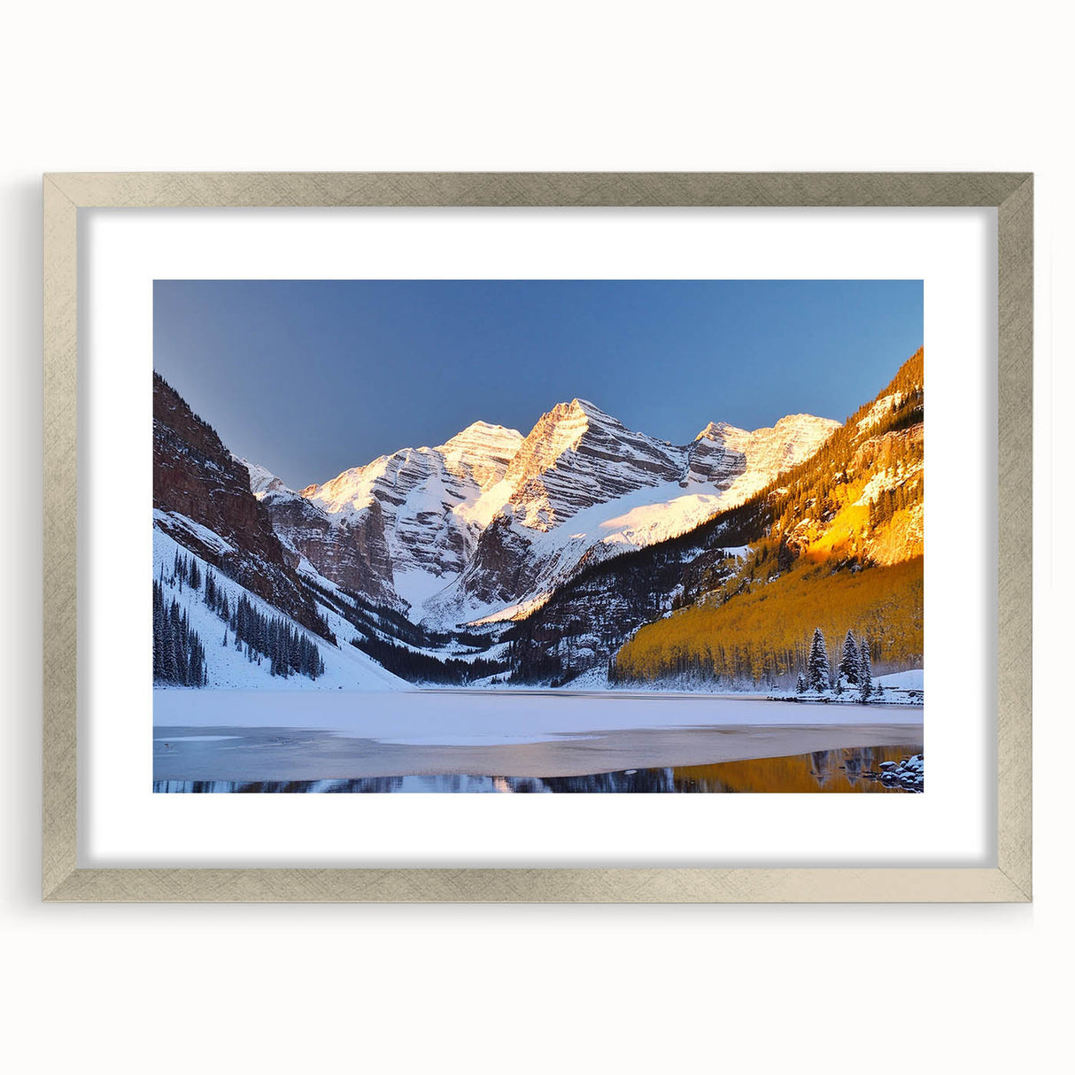 Textured art print of Maroon Bells, Colorado, in muted earth tones, framed in silver, ideal for bedroom decor.