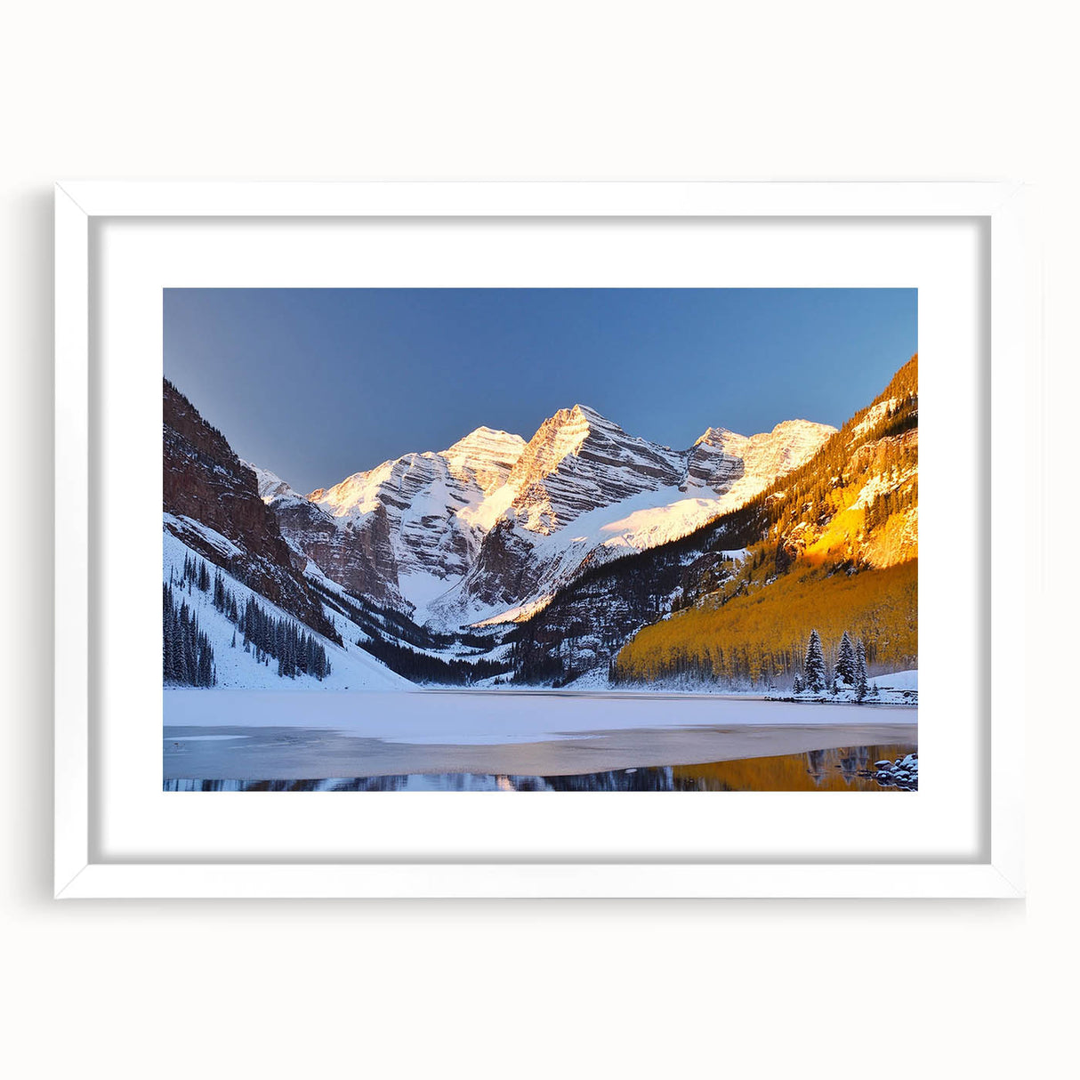 Abstract art print of Maroon Bells, Colorado, in muted earth tones on a framed white mat, suitable for dining room decor.