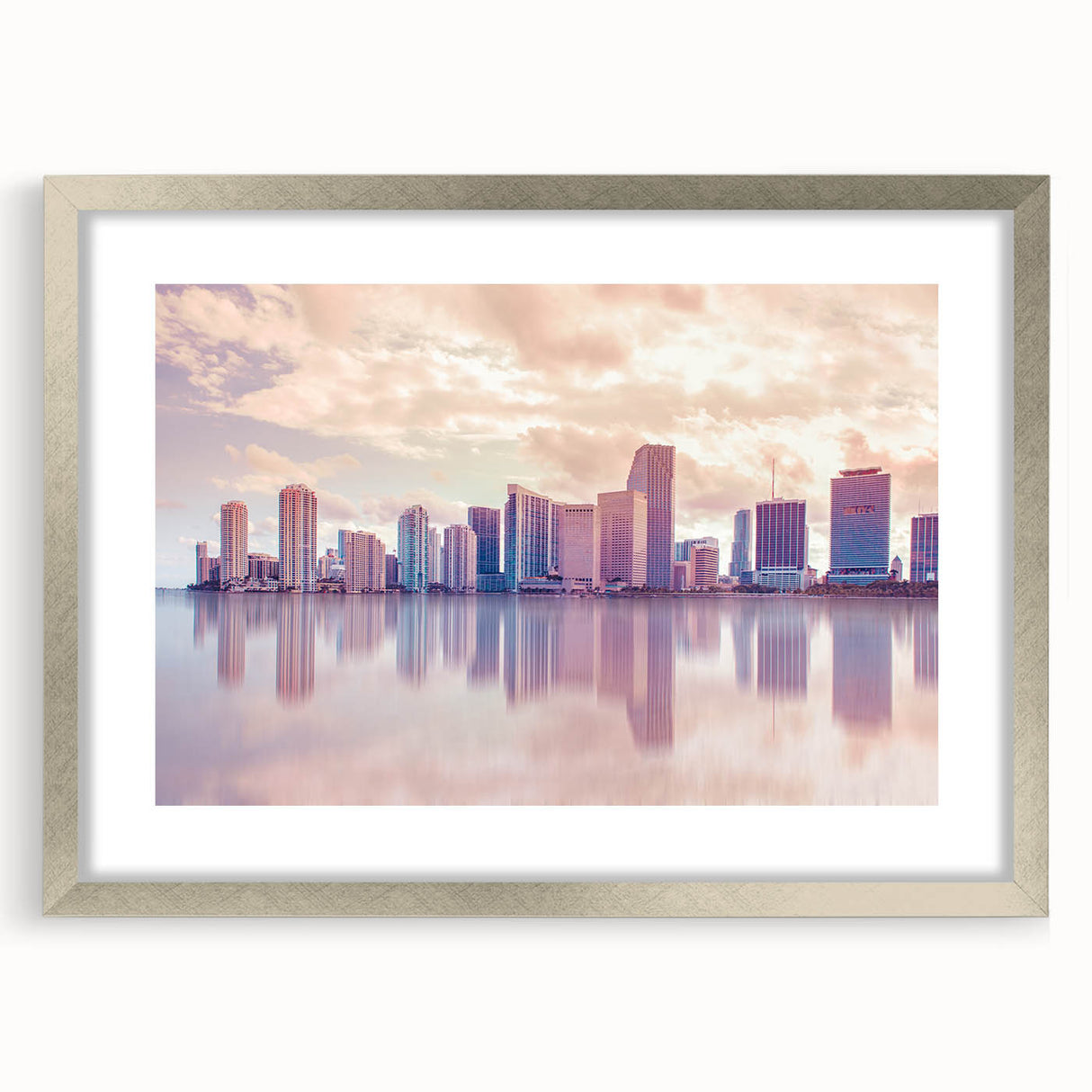 Textured abstract art print of Miami scenery in muted blue and gray, framed in silver, ideal for bedroom art.