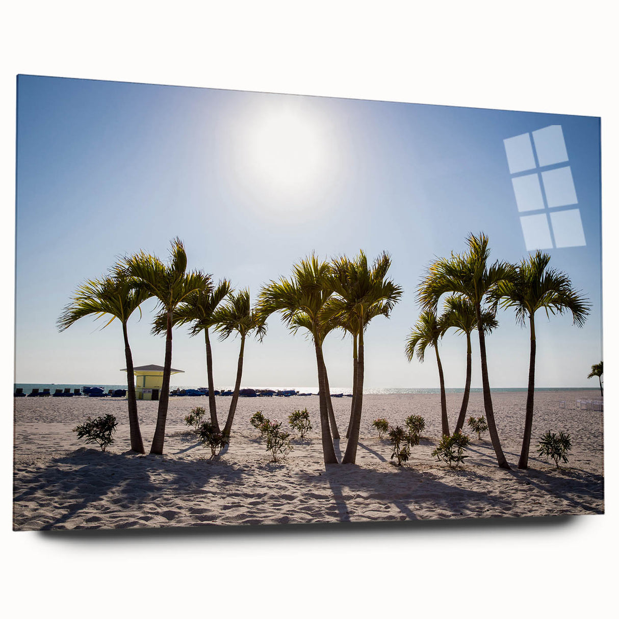 Large abstract wall art of a Florida beach scene in soft blue and pink tones on acrylic glass.