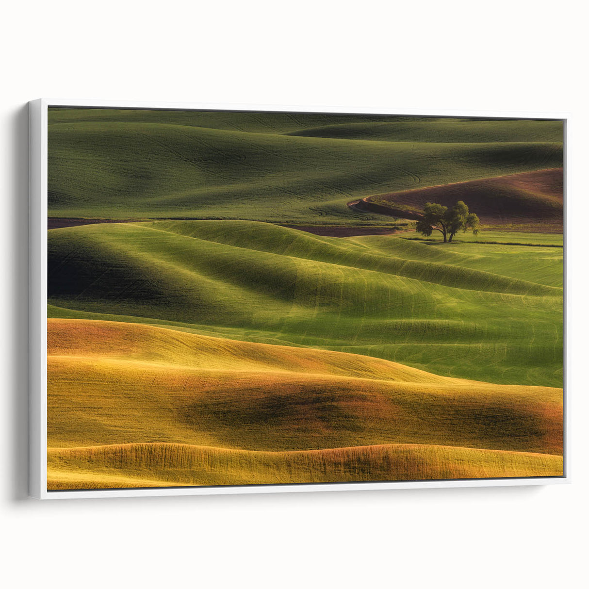 Vintage poster art of Idaho scenery on a large framed canvas, featuring colorful imagery against a black background.