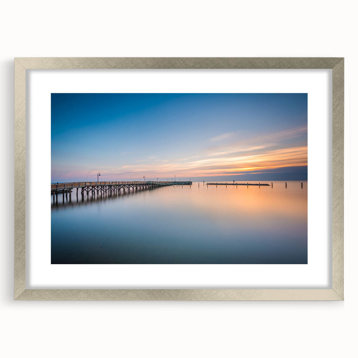 Textured art of abstract Chesapeake Bay in muted blue and green tones, silver-framed with mat, ideal for bedroom art.