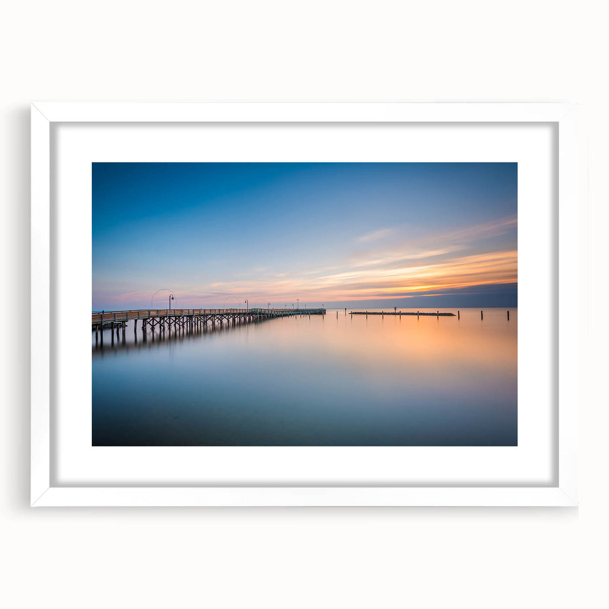 Abstract art print of Chesapeake Bay in muted blue and gray tones on a white framed mat, suitable for dining room decor.