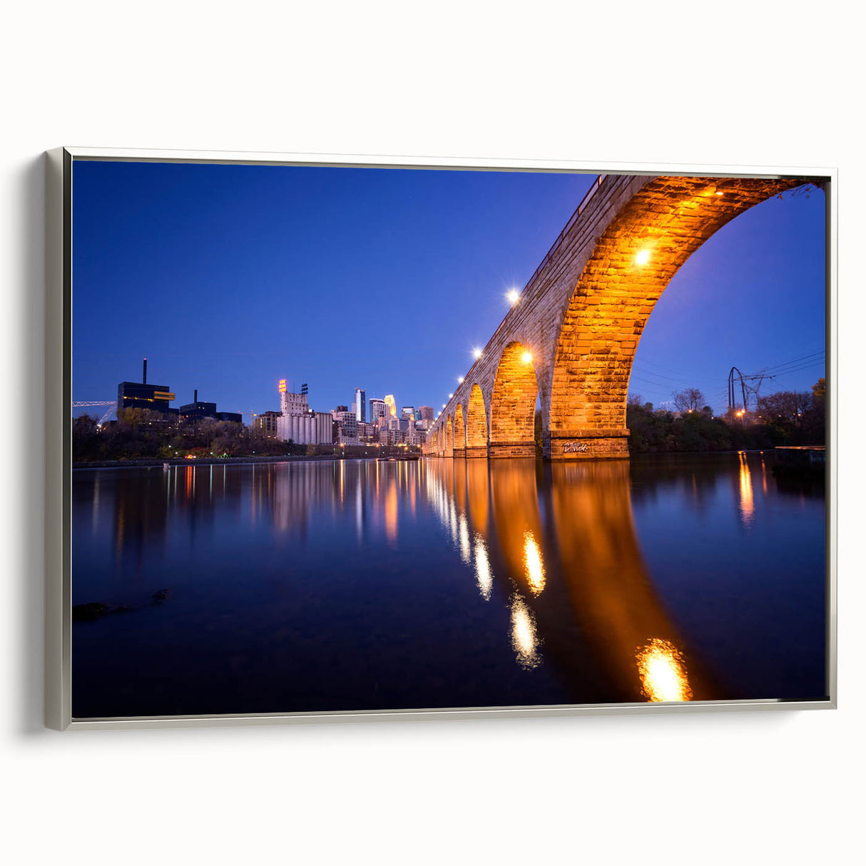 Framed canvas depicting a colorful Minneapolis skyline with vintage poster art style, ideal for office or living room decor.
