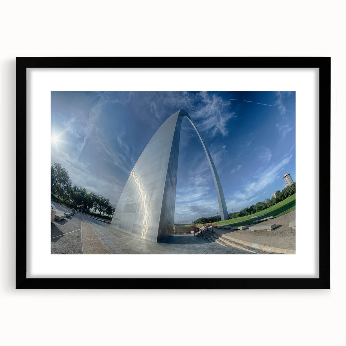 Colorful abstract art print of St. Louis skyline in vibrant hues on a large textured canvas, ideal for living room decor.