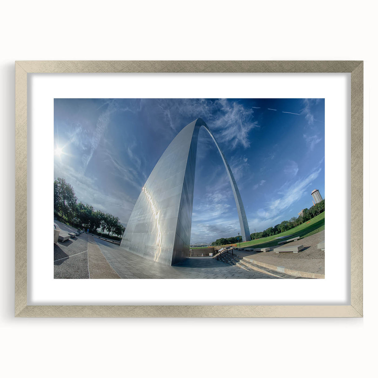 Textured art print of St. Louis skyline in abstract style with silver frame, ideal for modern bedroom ambiance.