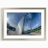 Textured art print of St. Louis skyline in abstract style with silver frame, ideal for modern bedroom ambiance.