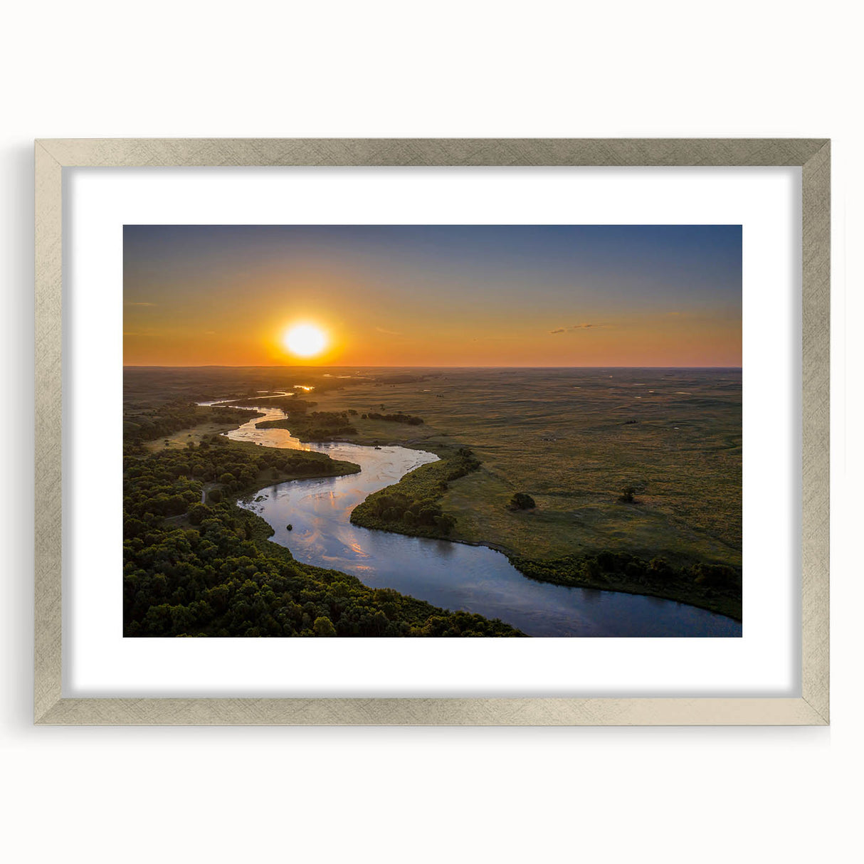 Textured art print of an abstract Nebraska landscape in muted earth tones on a silver-framed mat, ideal for bedroom art.