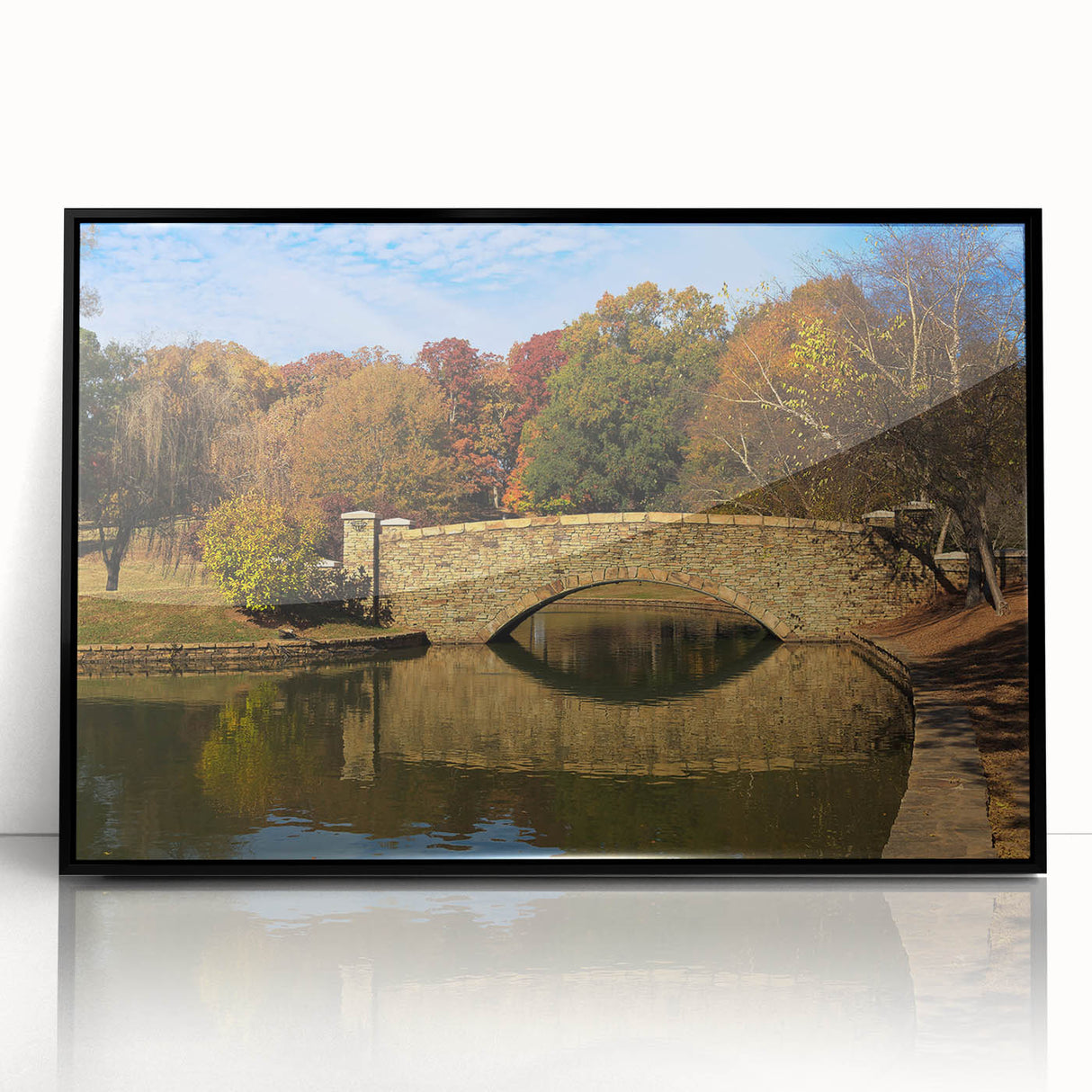 Large abstract wall art of Charlotte skyline in muted gray and blue tones, acrylic print framed in black.