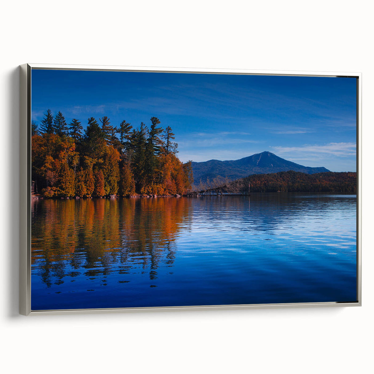 Framed canvas depicting a vintage-style landscape of the Adirondacks in muted colors.