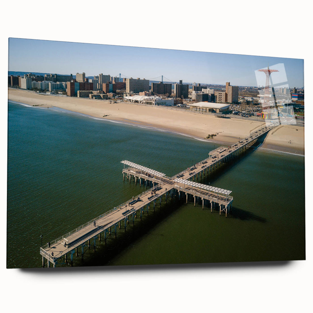 Large abstract depiction of Coney Island in muted blue and gray tones on acrylic glass.