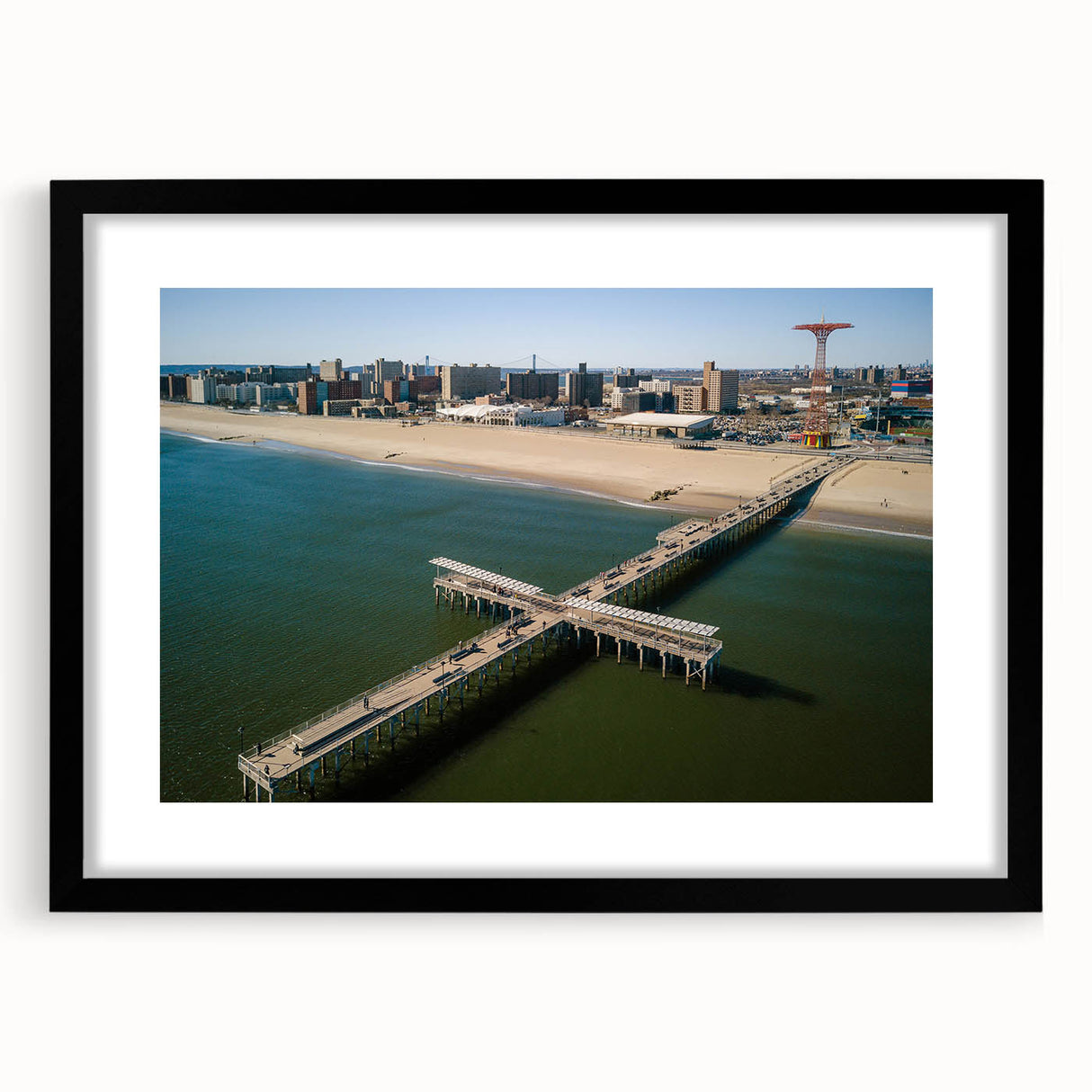 Colorful abstract art print of Coney Island in vibrant hues on a large textured canvas, ideal for living room decor.
