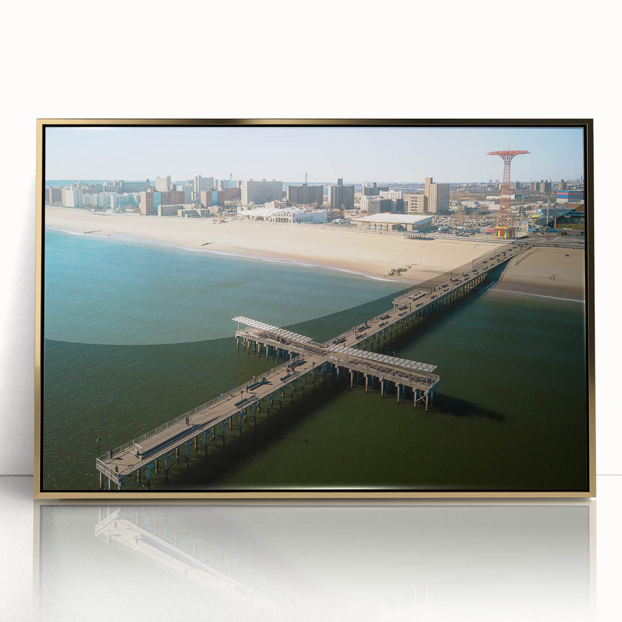 Framed acrylic print of Coney Island with muted gold and blue tones, ideal for modern art wall decor.