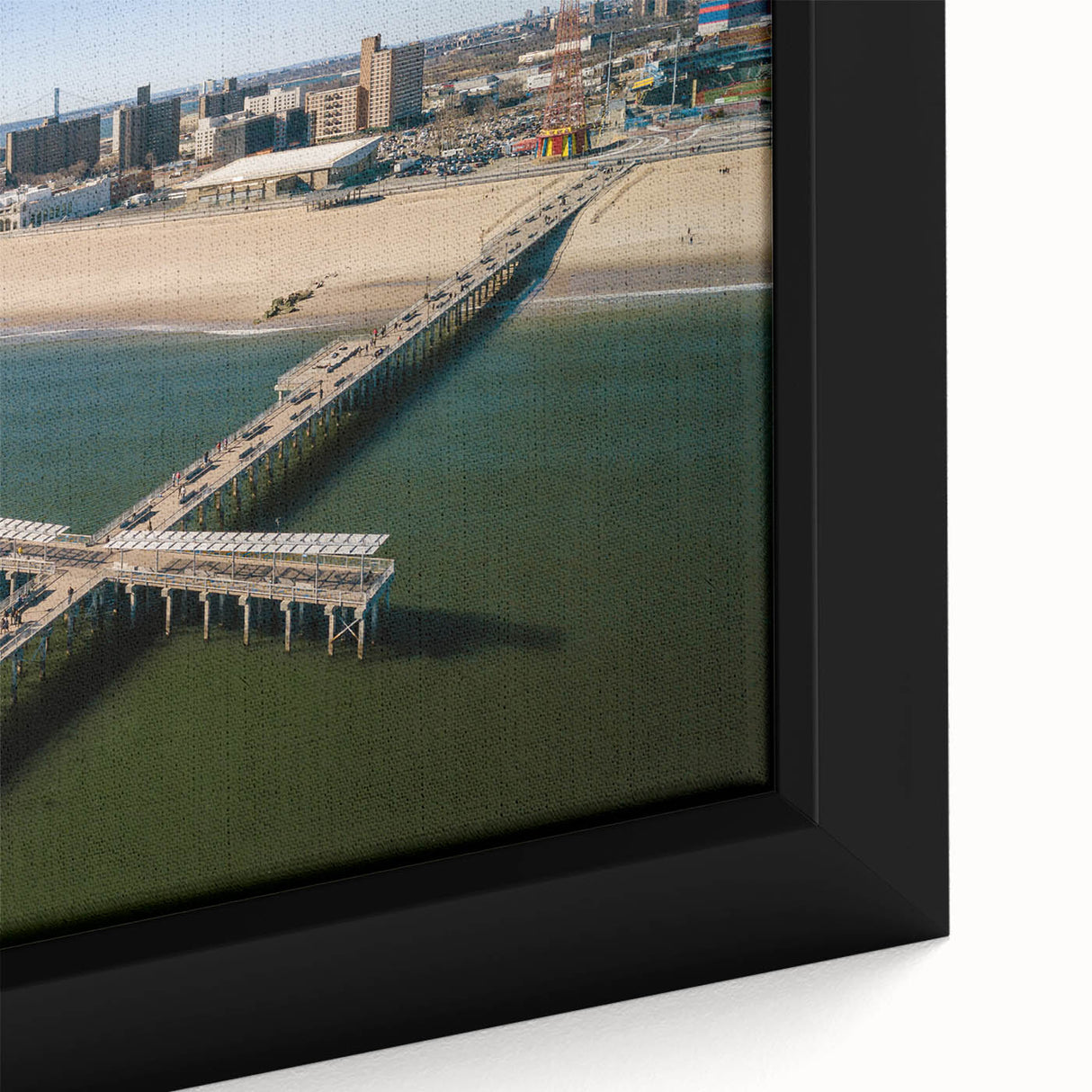 Extra large framed canvas depicting Coney Island with textured, colorful art on a black background.
