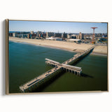 Framed canvas wall art featuring a vintage-style Coney Island landscape in black and gold tones, ideal for bedroom decor.