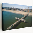 Side view of a stretched canvas depicting Coney Island scenery in muted earth tones, suitable for kitchen wall art.