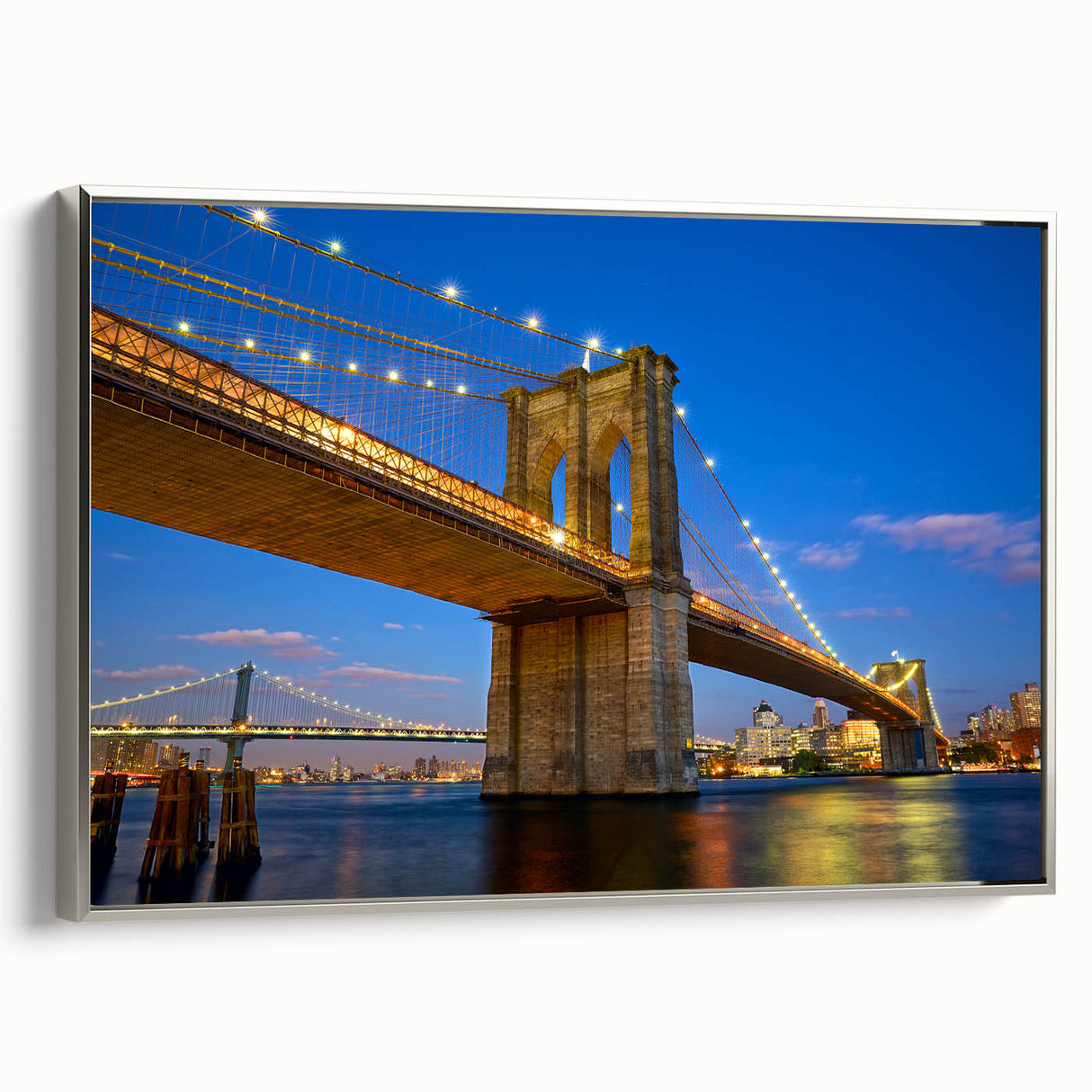 Framed canvas of Brooklyn Bridge in black with colorful skyline, ideal for office or living room decor.