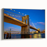 Framed canvas of Brooklyn Bridge in black with colorful skyline, ideal for office or living room decor.