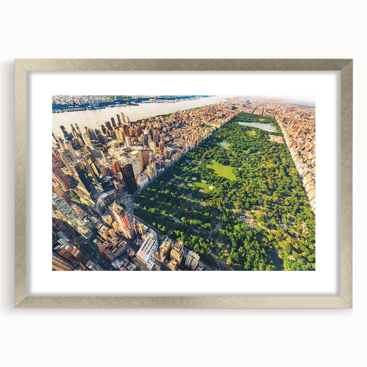 Textured art depicting abstract Central Park scene in muted green and brown tones on a framed silver mat.