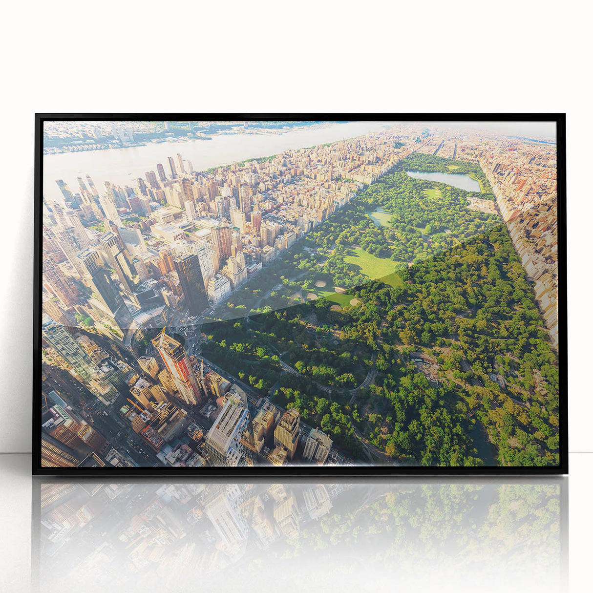 Large abstract wall art of Central Park in muted green and brown tones, framed in black acrylic.