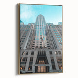 Side view of the Chrysler Building in gold tones on a black framed canvas, suitable for bedroom wall art.