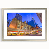 Textured art print of abstract New York City skyline in muted gray tones on a silver-framed canvas.