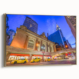 Framed canvas wall art featuring a vintage poster of Grand Central with a landscape in black and gold tones.