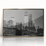 Acrylic print of Manhattan skyline in gold and black tones on a framed canvas, suitable for modern art wall decor.