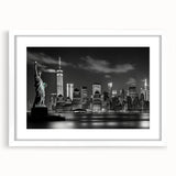 Abstract art print of New York City skyline in muted gray and blue tones, framed with a white mat.