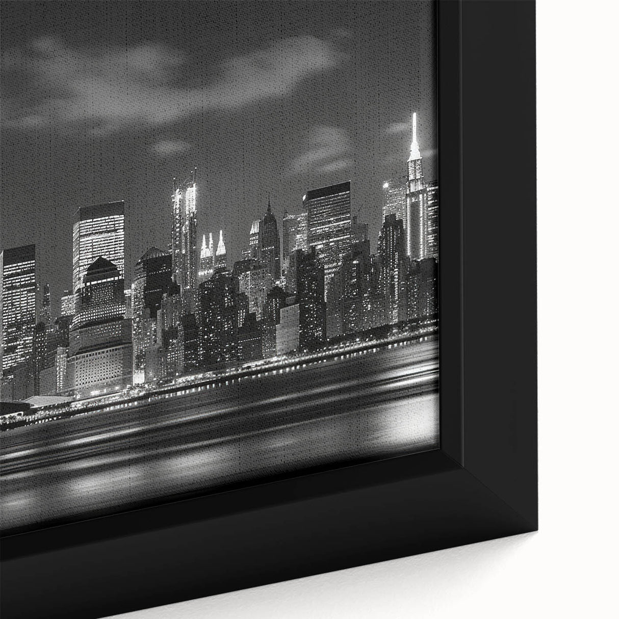 Extra large framed canvas featuring a textured depiction of NYC's Rockefeller Center in black with colorful accents.