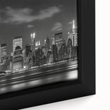 Extra large framed canvas featuring a textured depiction of NYC's Rockefeller Center in black with colorful accents.