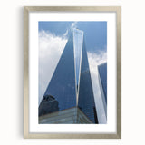 Textured art of NYC skyline in muted gray and blue tones on a framed silver mat, ideal for modern bedroom ambiance.
